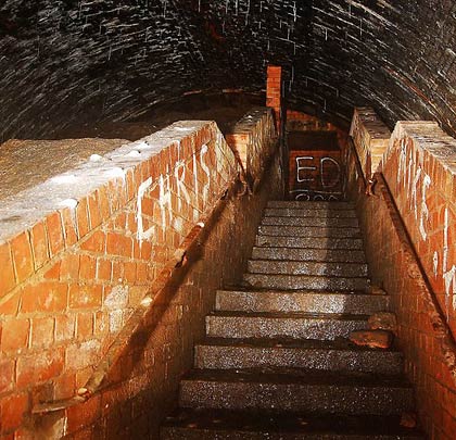 Stairs leading from the air raid shelter to street level.