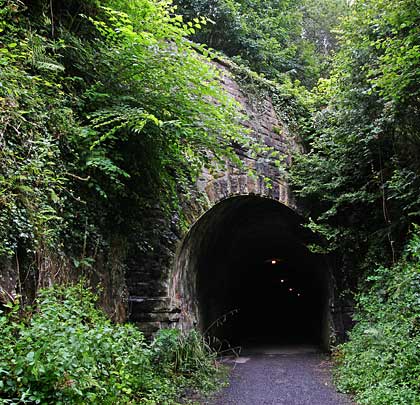A road passes over the south end of the tunnel, resulting in the masonry portal being built on a substantial skew.