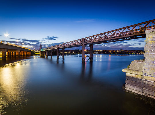 Designed by Messrs Galbraith & Church, the bridge extends for 213 yards at a height of 26 feet above high water level.