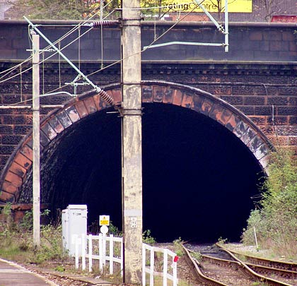 Now Grade II listed, the eastern portal is built from pink sandstone and was sufficiently wide to accommodate switches and crossings.