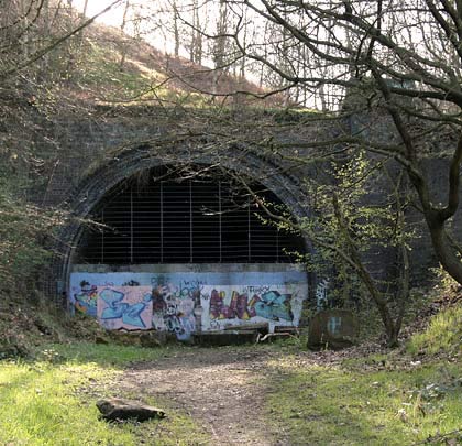 Although its southern portal is now buried, the northern entrance to Ardsley's curved tunnel still looks out into a short cutting which walkers pass by on the Trans Pennine Trail.