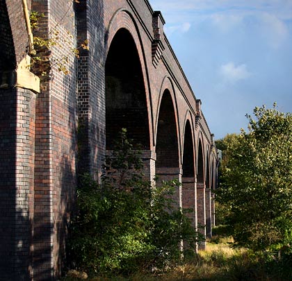 The eastern group of eight arches, with their brickwork glistening.