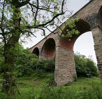 A classic viaduct: Willow Burn's stone piers and sprandels contrast with its brick arch soffits.