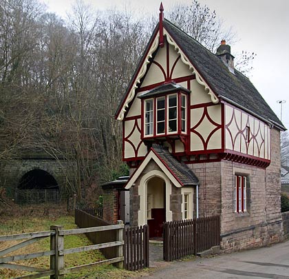 Overlooked by the south portal of Oakamoor Tunnel is this delightful and well cared for crossing keeper's cottage.