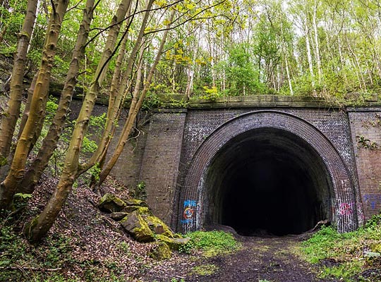 The northern part of the tunnel was driven through very heavy ground, demanding a lining of almost 5 feet in thickness at the crown.