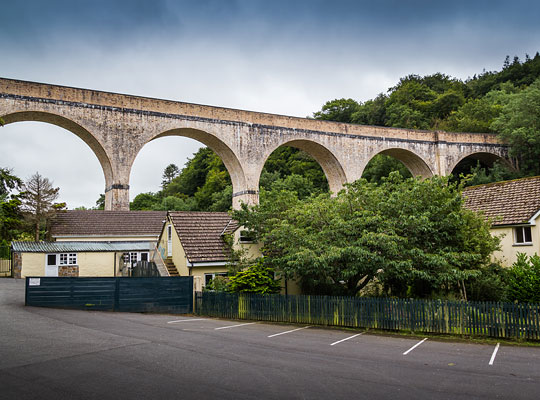 The viaduct soars over a school - now disused - as well as two mill races and a road.