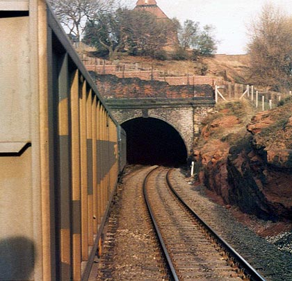 40035, VTG Ferrywagon and a brake, enters Tiviot Dale Tunnel at its west end on 8th February 1979.