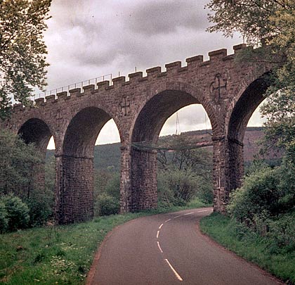 A road used to pass beneath one of the arches, protected from falling material by netting slung between the adjacent piers.