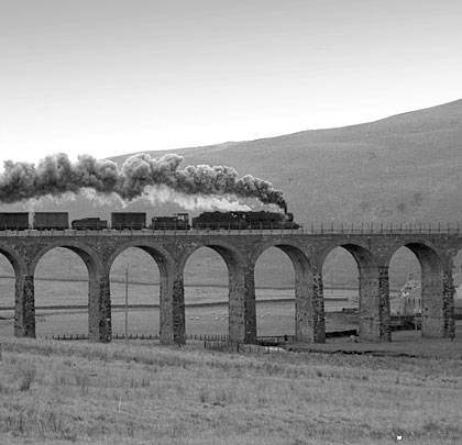 Belching smoke, a southbound freight climbs towards Whitrope.