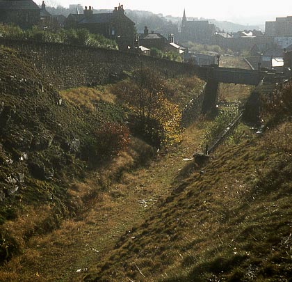 Heading towards Dewsbury Central, the trackbed passed beneath a bridge as it emerged from the tunnel's approach cutting
