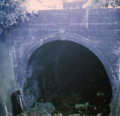 Also lost to the road was the tunnel's northernmost 25 yards, together with this imposing portal and its datestone.