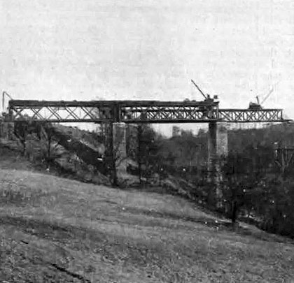 Temporary girders were installed to allow the steel contractor's cranes to operate which travelled along their upper beams.