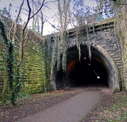 A walled cutting lead the railway to Ashbourne's nearby station.