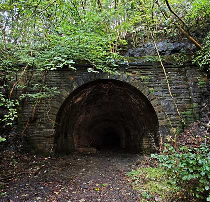 Architecturally similar to its sibling, the other portal faces more west than north as a result of the tunnel's curvature.