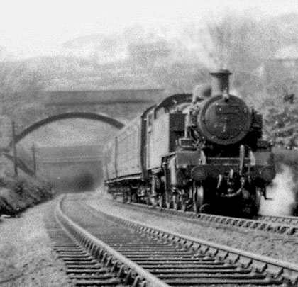 Captured in the 1930s, a Delph-bound train leaves Lydgate's east end.