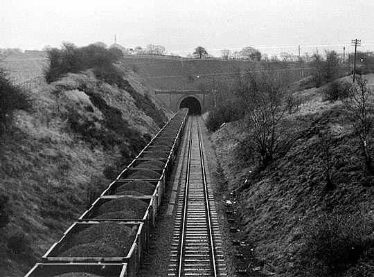 Coal wagons stand at the tunnel entrance in the late Sixties.