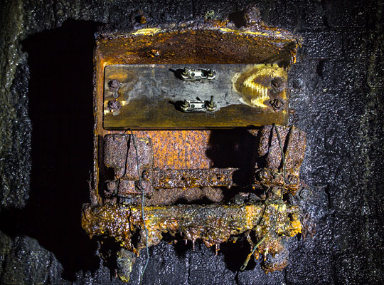 Relics from the line's signalling and telegraph systems remain in situ within the tunnel.