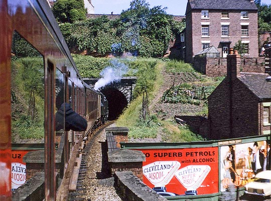 Heading for Shrewsbury, LMS Ivatt Class 2 2-6-2T No. 41202 approaches the tunnel's south portal in August 1963.