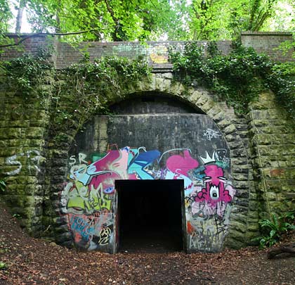 The northern portal is masonry with a brick parapet wall.