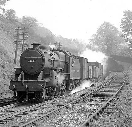 42874 bursts out of the north portal with its wagons on 9th May 1953.