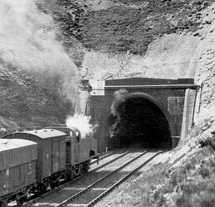 A Halifax-bound goods approaches the Down Section signal as it prepares to enter the tunnel's northern entrance.