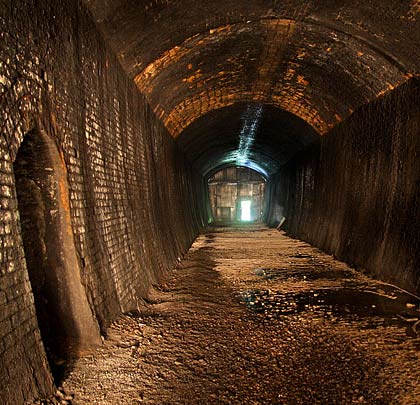 The tunnel's southern section boasts near-vertical side walls and an arch soffit springing off high haunches.