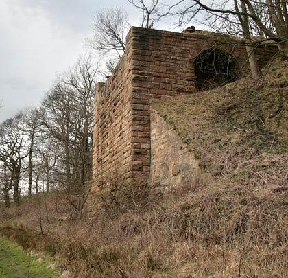 The substantial structure is masonry-built and with wing walls to hold back the approach embankment.