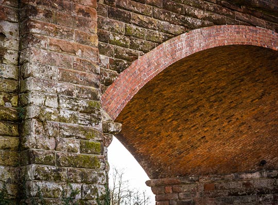 The structure is stone-built except for the brick arch barrels. The skew span must have presented considerable challenges to the engineer.