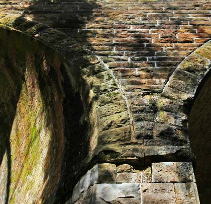 Although the structure is built predominantly in stone, the arches themselves are constructed in brick.