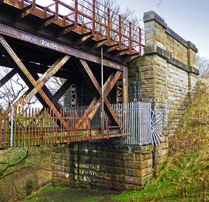 The substantial masonry abutment at the viaduct's northern end.