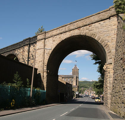 A wide, skew arch over Stainland Road.