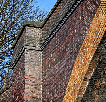 Although predominantly built in blue engineering brick, the arch faces present a much warmer colour.