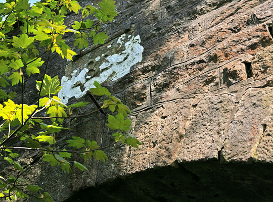 Hiding behind a branch is a datestone recording the tunnel's completion in 1833.