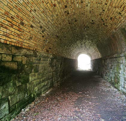 The structure features masonry sidewalls and a brick arch. The outer brick ring at the crown and north (left) side looks to be of a different type to that on the south side, presumably due repairs.