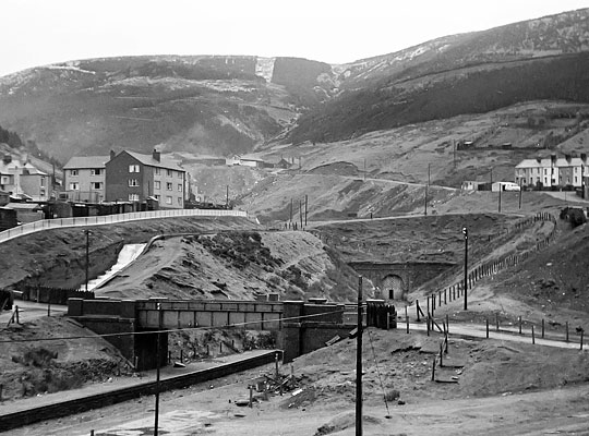 In 1973, the melancholy scene at Blaengwynfi following closure and track lifting. The shaft chimney is just visible above the left hand end of the portal.