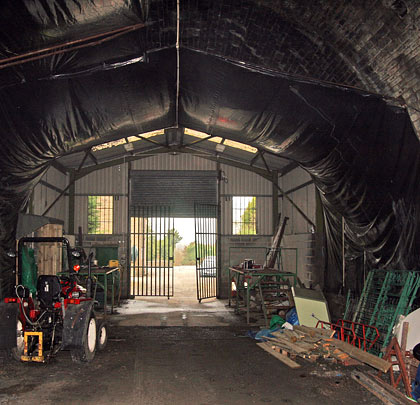 The tunnel is home to caravans and assorted equipment.