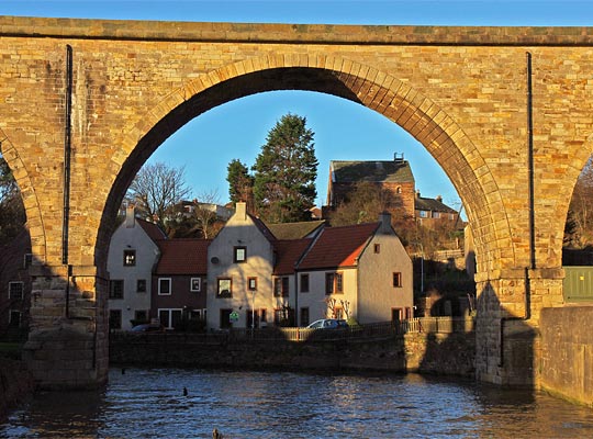 The river span reaches a height of 60 feet above the water.