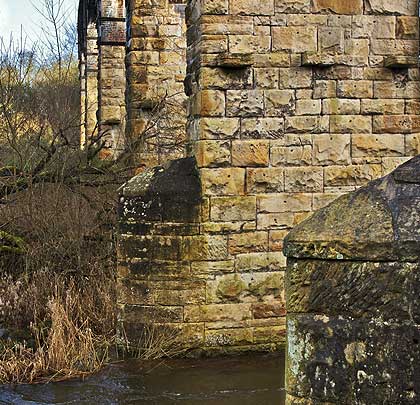 The piers are protected by cutwaters whilst their faces still feature the stone blocks used to support the arch centring.