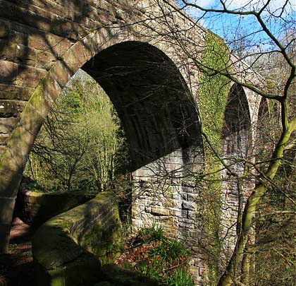 Basking in morning sunlight, the viaduct is built entirely from fine stone sourced from local quarries.