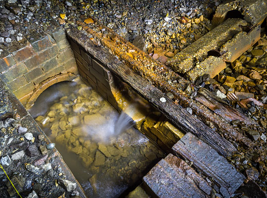 Pipework manages the water into a drain which discharges into a stream 400 yards away.