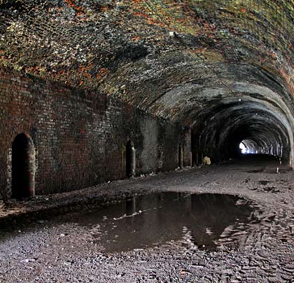 Although short, the tunnel incorporates a tight curve to the west.