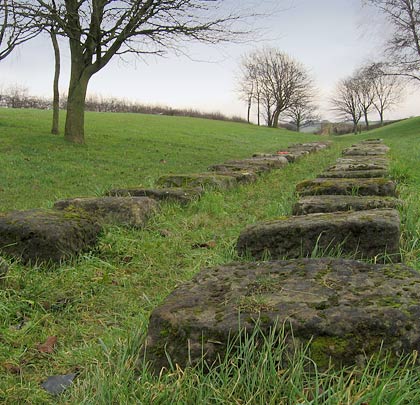 Stone sleepers mark the summit of the northern incline.