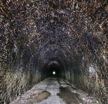Although wet, the lining towards the tunnel's northern end remains in good condition and features two changes in section.