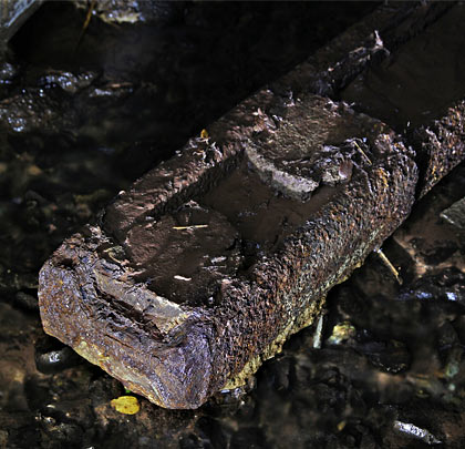 A few short lengths of bullhead rail can still be found in the darkness.