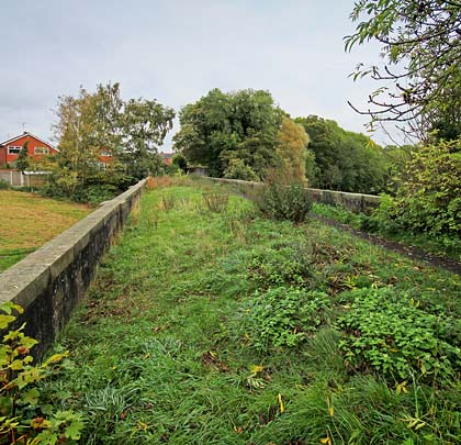 Although overgrown, the deck is now used as a footpath.