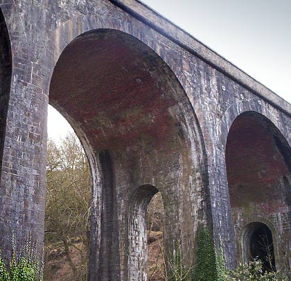 The piers include arches to reduce their weight and focus the forces.
