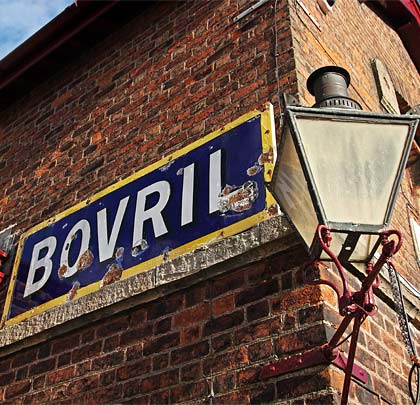 Enamel signs and a gas lamp give the station a 1950s feel.