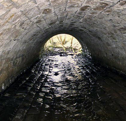 With an arched profile, this is the interior of a larger culvert about 300 yards further north.