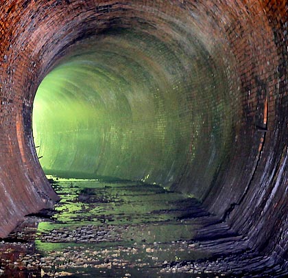 Lined in brick, the tunnel incorporates an obvious cant and a curve to the west of approximately 52 chains in radius.
