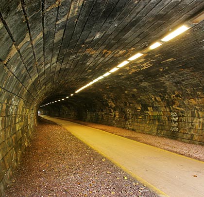 Courses of ashlar were used to line the tunnel, leading the eye towards a slight curve to the west.
